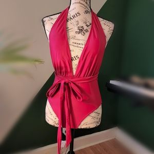Fuchsia low cut swimsuit.